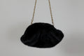 Clutch in pelliccia sintetica nera
